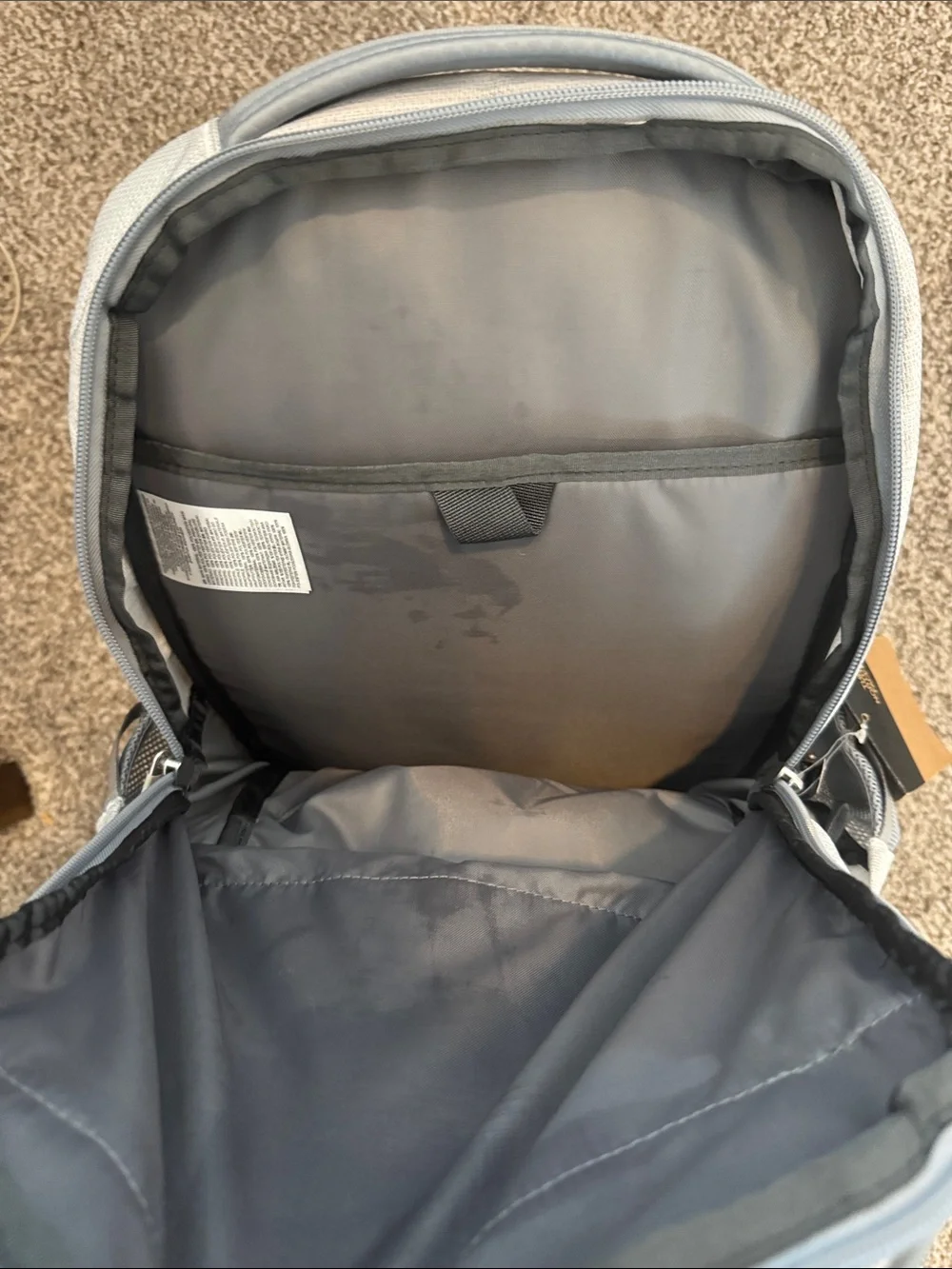 The North Face Light Gray Backpack with Bungee Front